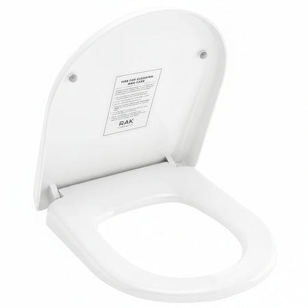 A white ceramic toilet seat 