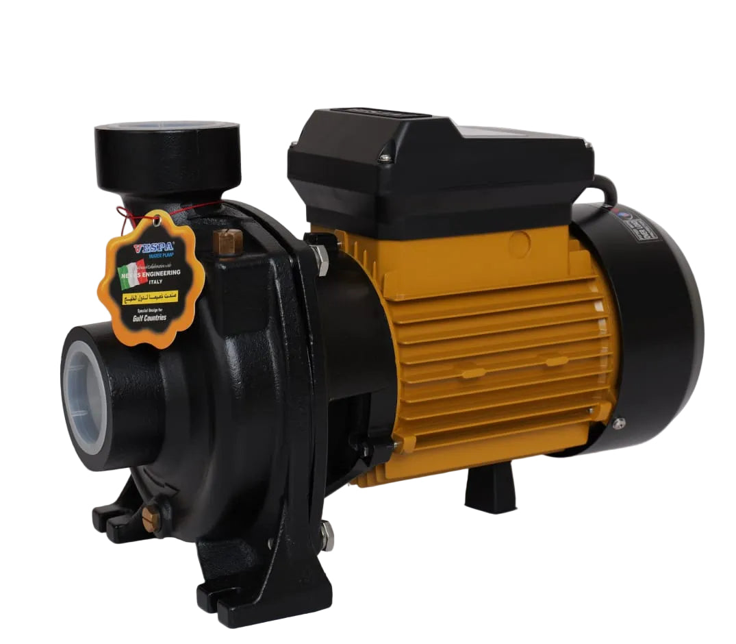 A black and yellow electric water pump with a black motor housing, black casing, and a yellow warning label on the side.