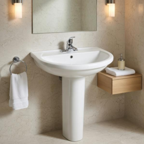 Bathroom with a white pedestal sink, wooden shelf, and towel rack.