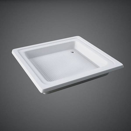 White rectangular sink on a dark gray background