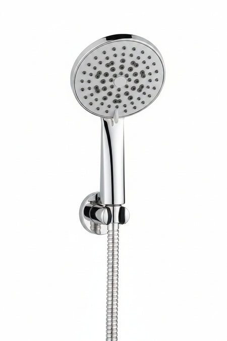 A polished chrome handheld shower head with a flexible coiled hose and wall mount