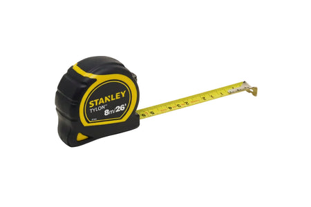 Stanley tape measure with black and yellow design on a white background