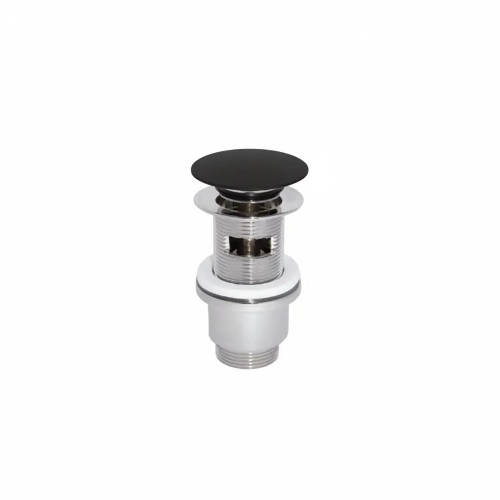 A chrome-finished bathroom drain assembly with a black round stopper cap.